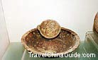 Pottery plate and a deep bowl carved with unique designs, Luoyang Ancient Tombs Museum.