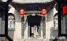 A glimpse of the courtyard through an exquisite lattice window, Pingyao.