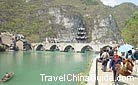 Qinglong Cave is not a cave, but an ancient building complex built on the narrow precipice areas along the tranquil Wuyang River, Guizhou.