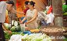 A glance at common people''s life in China - vegetables are usually bought from such vendors in the free market.