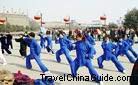 Xi'an citizens paly Taiji, a kind of Chinese traditional exercise, every morning in the park around the ancient city wall