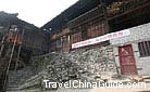 The stone stairs lead to the wooden house, Da Boji Miao Village