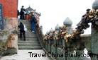 Visitors are ascending steps to the Gilt Bronze Hall