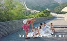 A pair of lovers is taking wedding photo on the Jiaoshan Great Wall