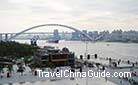 The Shanghai World Expo Site is between the Nanpu Bridge and Lupu Bridge, at the waterfront area on both sides of the Huangpu River.