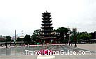 The old wooden pagoda in Zhangye is a nine-storey building. It has a unique octagon shaped wooden structure in each tier with eight dragonhead woodcarvings in each angle, a bead in the mouth, and a wind-bell under the neck.