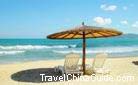 Various beach umbrellas add attraction of the Yalong Bay, relaxed and sightly.