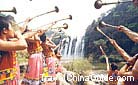 A local musical instrument show at the Huangguoshu Waterfall, Guizhou.