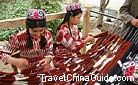 The dresses the girls wearing are made of the tie-dyed silk thread at their hands, Xinjiang