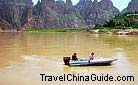 The towering stone peaks along the Yellow River constitute the unique scenery of Bingling Thousand Buddha Caves in Lanzhou.