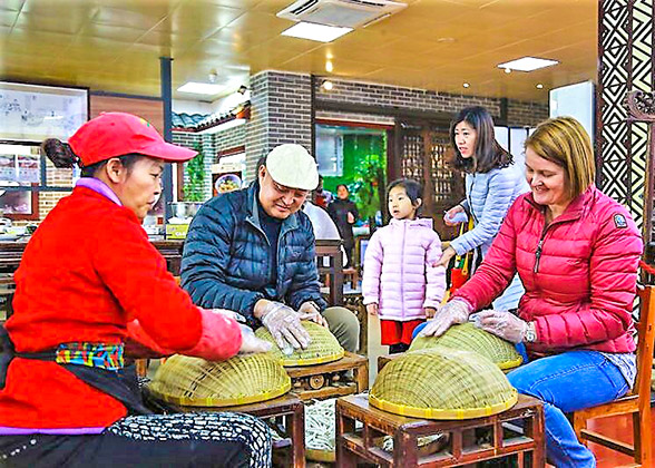 Visitors Learning Making Fans